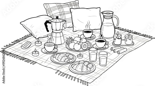 A cozy picnic blanket spread with breakfast items and pillows