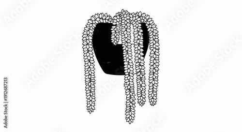 A black hanging planter with trailing green succulents