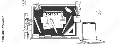 A desk with stationery, flowers and a chalkboard