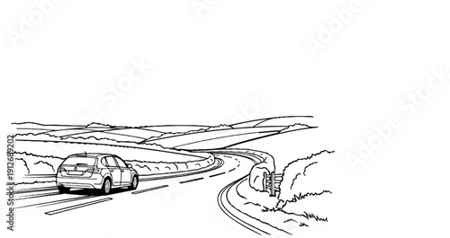 A car drives along a winding road through rolling countryside under a clear sky
