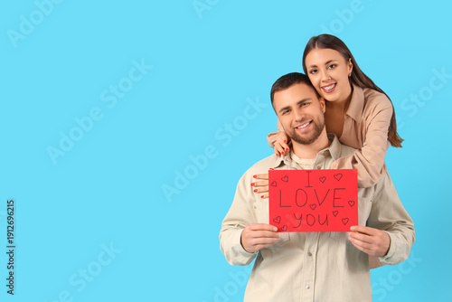 Lovely couple holding greet...