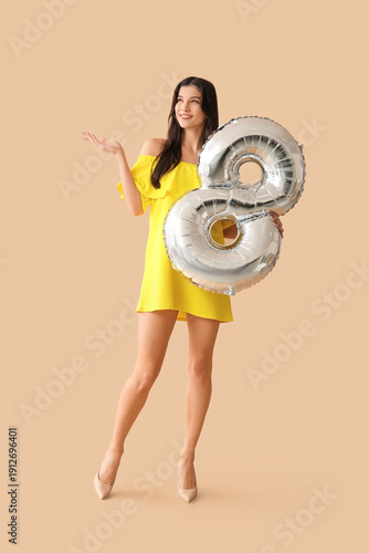 Beautiful young woman with ...