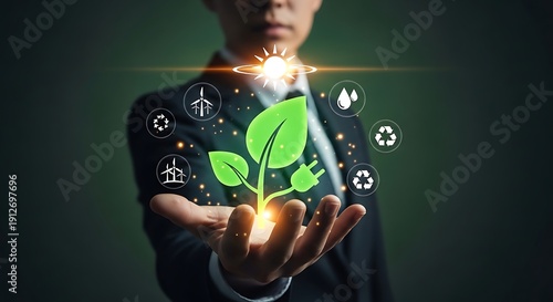 A businessman holding a glowing green plant with eco-friendly icons surrounding it