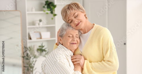 Mature woman with her mothe...