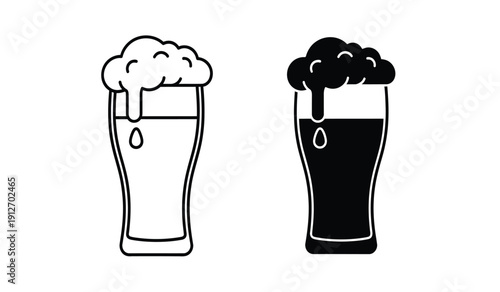 Two glasses of beer one light and one dark with foam on top