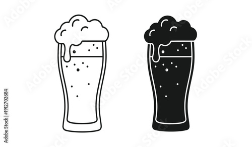 Two glasses of beer one light and one dark with foam on top