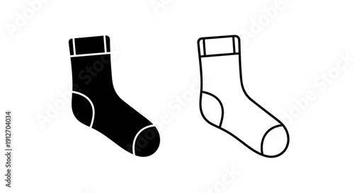 Pair of socks, one black and one white, isolated on white background Vector