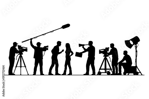 Silhouette of a film crew with equipment and actors on set.