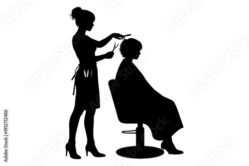 Silhouette of female hairdresser cutting child's hair in salon.