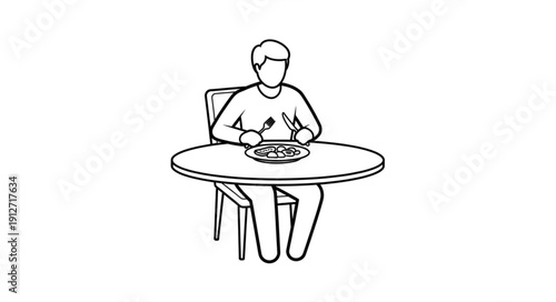 Person sitting at a round table eating a meal.