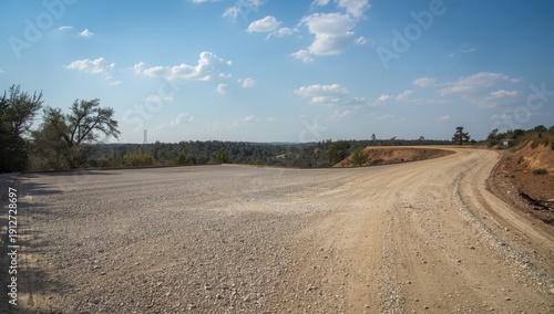 gravel lot along a dirt road