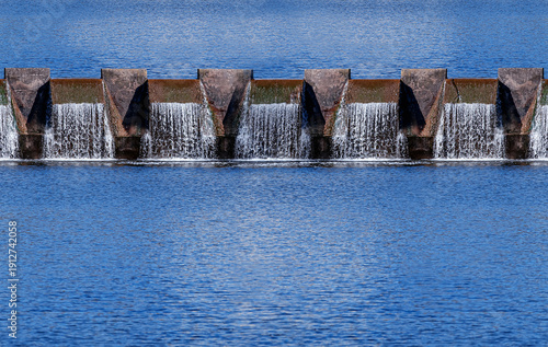 Сlean drinking water. Water flows through an industrial water treatment plant, cleansing the liquid. Water treatment plant releases clean water. 