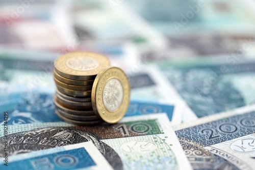 Coins and banknotes of Polish zloty and grosz currency. Poland PLN money close up. Business, economy and finance concept