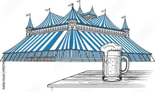 A large striped tent and a foamy beer mug on a wooden table