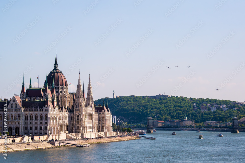 Fototapeta premium The Hungarian Parliament at the riverbank of Danube River in Budapest.