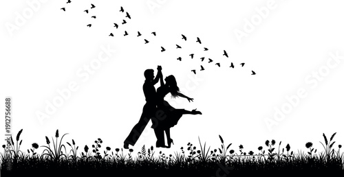 Romantic silhouette of a couple dancing in a flower field with a flock of birds flying in the white sky