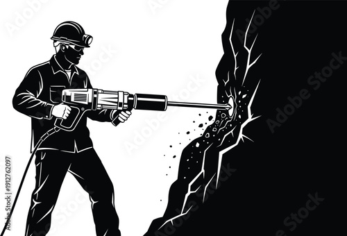 Strong male miner silhouette using heavy duty jackhammer power tool to drill rock wall for industrial underground mining extraction project