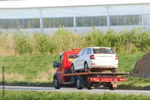 Wallpaper Mural Red truck towing vehicle on road Torontodigital.ca