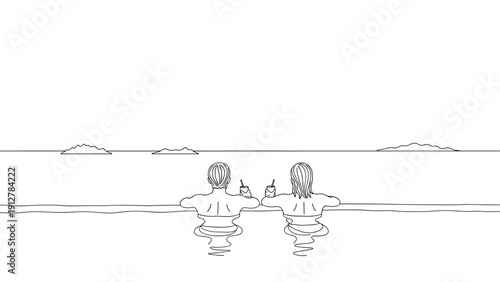 Outline of couple enjoying drinks at infinity pool with ocean view