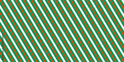 Christmas seamless pattern. Red and green diagonal stripes background. Candy cane repeating decoration wallpaper. Winter holiday lines backdrop. vector,eps.10