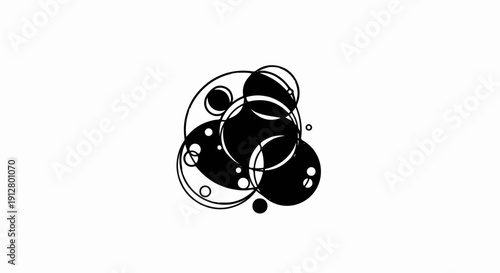 Abstract composition of overlapping black and white circles of various sizes