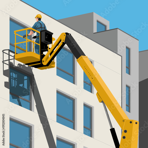 Man in yellow hard hat operates aerial lift on building exterior  construction worker at height