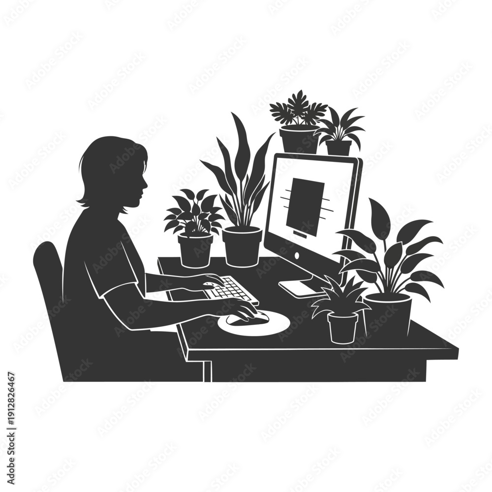 Fototapeta premium Silhouette of a person working on a computer with plants nearby