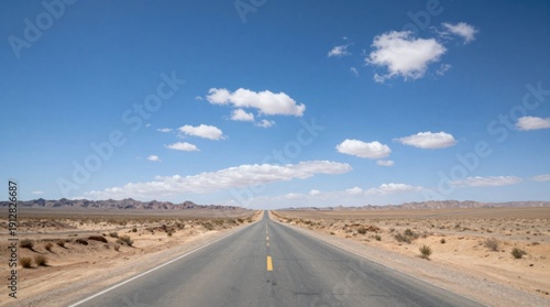 Endless Desert Highway Under a Blue Sky: Road Trip, Travel and Adventure Concept