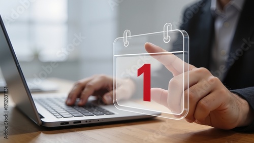 Person working on laptop with calendar icon