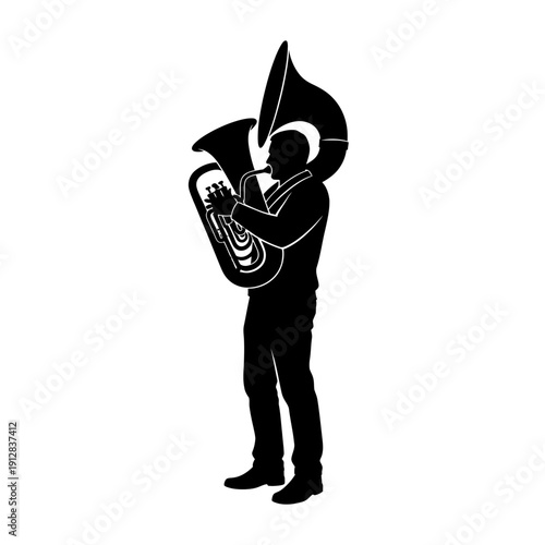Silhouette of a musician playing a large sousaphone brass instrument