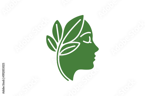 Woman's profile silhouette merges with green leaves symbolizing natural.
