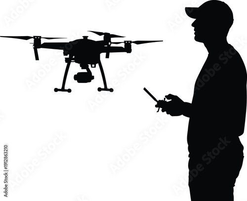 Silhouette of a person flying a drone with remote control, representing modern technology, aerial photography, surveillance, and recreational drone operation