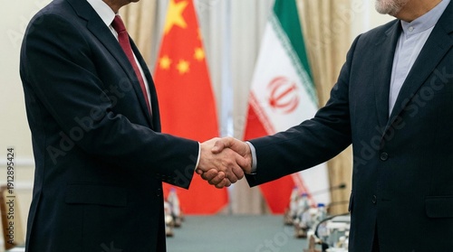 Two world leaders shaking hands formally signifying a significant diplomatic agreement or treaty between the nations of China and Iran during official talks.