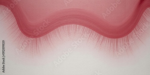 A close-up view of long eyelashes on a pink background