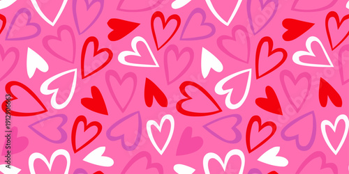 A vibrant pink background filled with scattered red, white, and purple hearts of various sizes and orientations