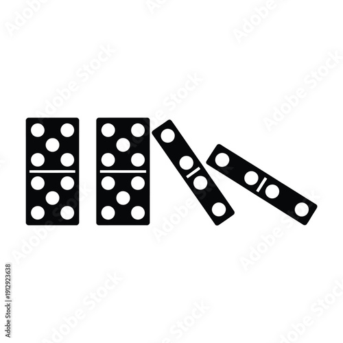 Black dominoes falling in a sequence creating a chain reaction