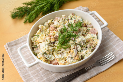 Tuna salad with eggs, feta cheese, red onion, dill and parsley