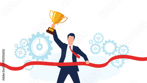 Successful businessman holding a gold trophy while crossing a red finish line in front of rotating gears, symbolizing the successful completion of a project.