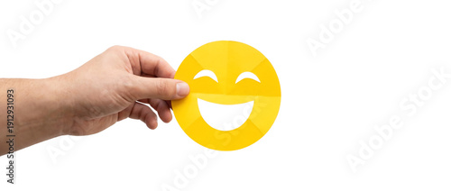 手に喜びを感じる明るいフェイスペーパー.