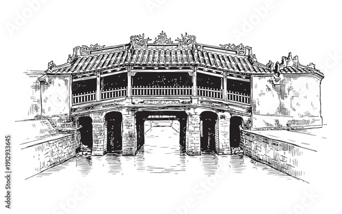 Billede på lærred Historical Japanese covered bridge in Hoi An with ornate roof and stone arches