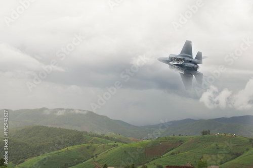 Fighter jet flies through the sky on technology background