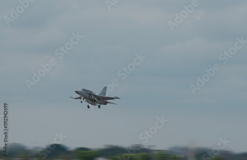 Supersonic fighter jet moving in airport on technology background