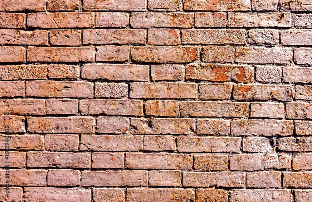 Obraz premium Old weathered red brick wall as creative background