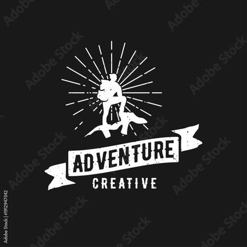 Vintage Adventure Creative Logo with Hiker Silhouette on Mountain Peak and Sunburst Rays