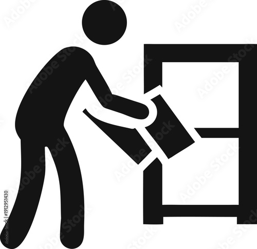 Skilled worker meticulously assembles a modular furniture unit in a modern workshop environment