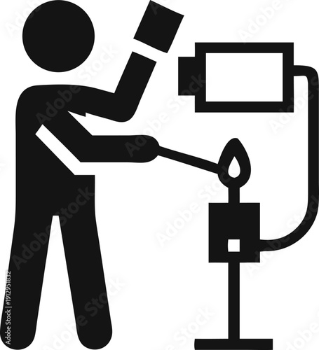 Skilled Artisan Working with a Blowpipe and Flame on Industrial Material Production