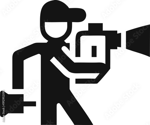 Man operating professional video camera with a shoulder rig for filmmaking production