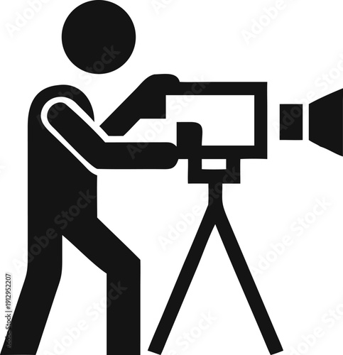 Professional videographer operates a broadcast camera on a tripod capturing important moments for media production