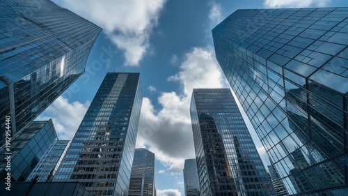 Wallpaper Mural Cinematic video of skyscrapers standing tall in a cityscape under a cloudy sky Torontodigital.ca