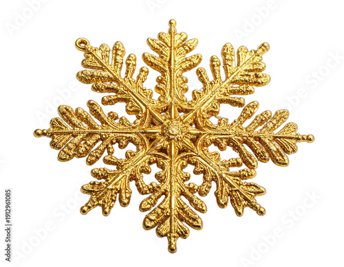 Ornate Golden Snowflake Ornament Isolated on Black Background